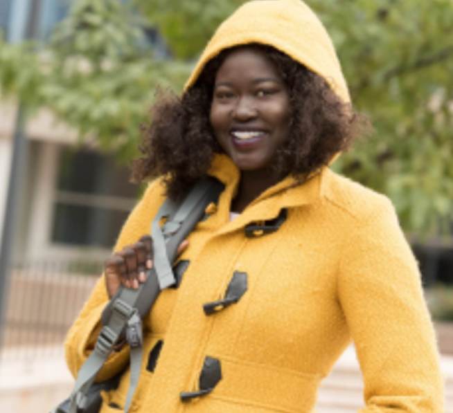 Student in yellow jacket